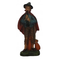 Pastor com flauta e chapéu