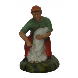 Pastor a tosquiar ovelha