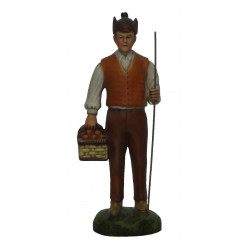 Pastor com cesta de maças