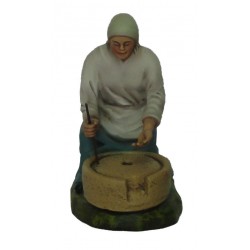 Pastora a moer milho